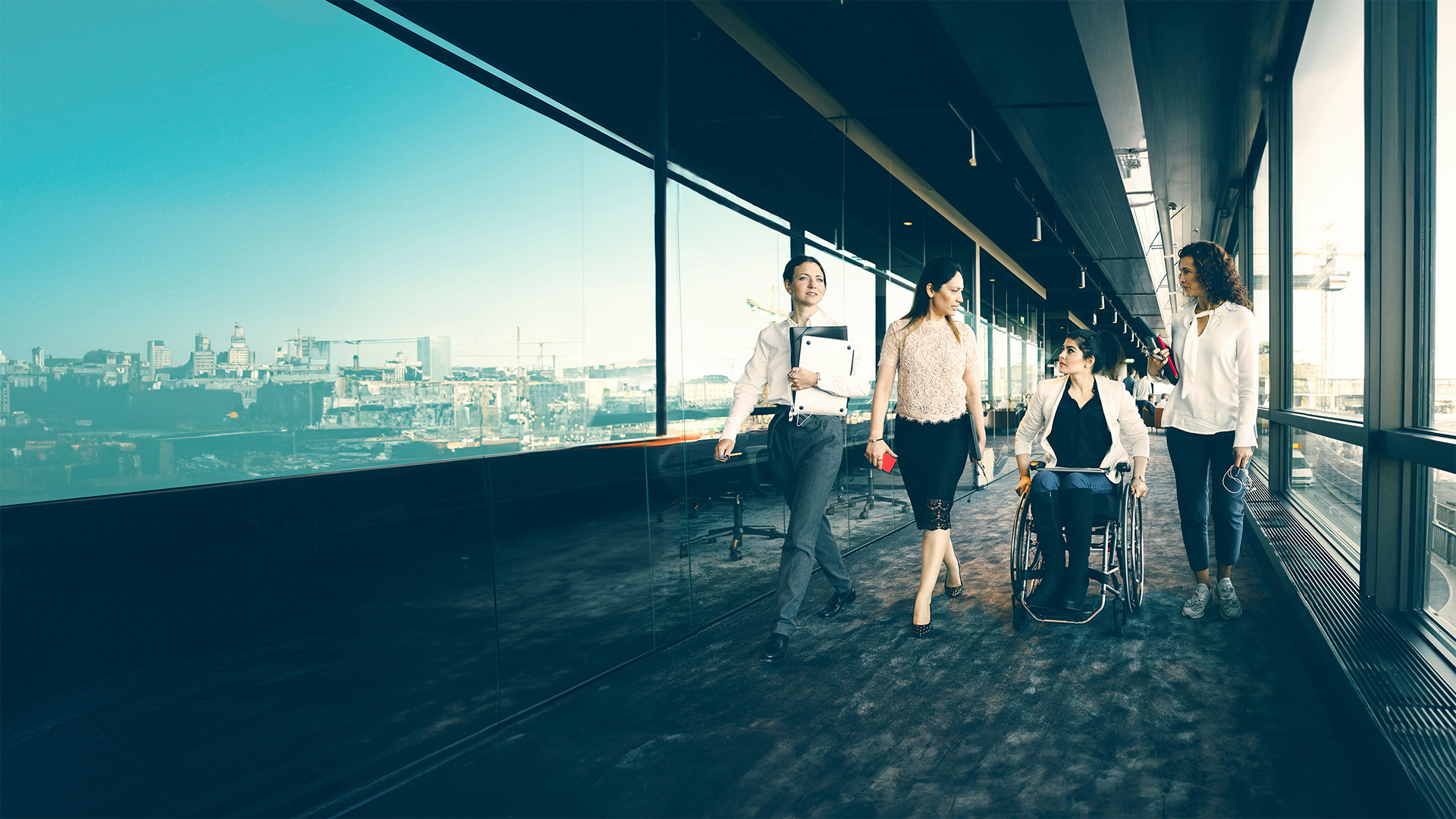 img-0546-women talking to disabled female entrepreneur-1920x108